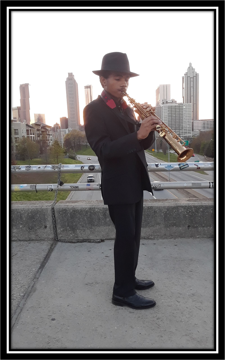 Khari Marquette with saxophone